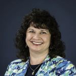 Dr. Carmel-Ann Mania