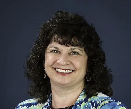 Dr. Carmel-Ann Mania