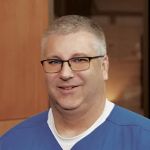 Timothy L. Smykal, DC