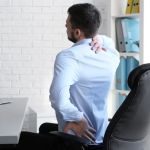 Understanding the Connection Between Desk Job Posture Problems and Your Spine