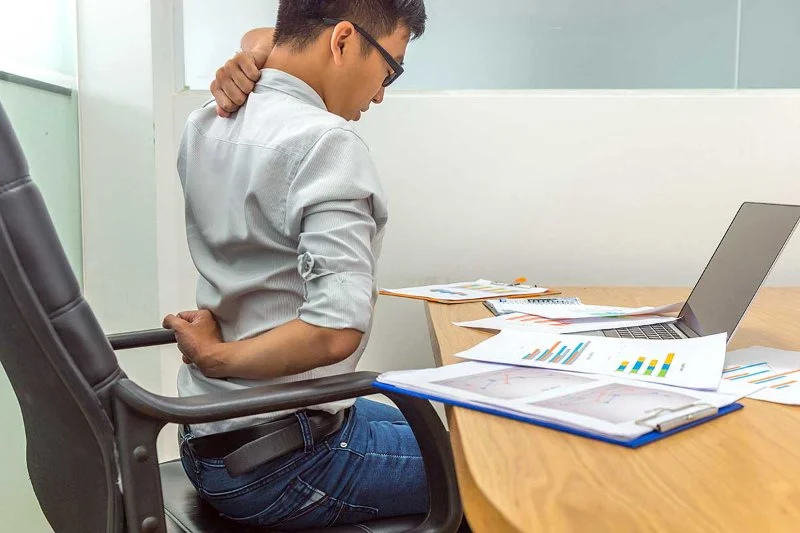 How to Sit at Your Desk to Avoid Back Pain: Chiropractor Approved Tips for a Healthy Workstation